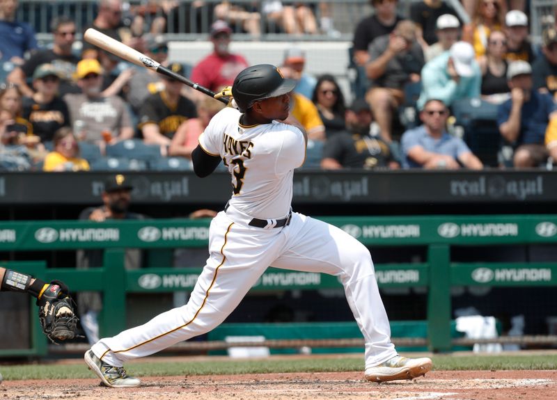 Jun 7, 2023; Pittsburgh, Pennsylvania, USA;  Pittsburgh Pirates third baseman Ke'Bryan Hayes (13) hits a triple against the Oakland Athletics during the sixth inning at PNC Park. Mandatory Credit: Charles LeClaire-USA TODAY Sports