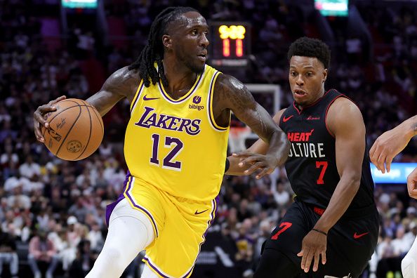 MIAMI, FLORIDA - NOVEMBER 06: Taurean Prince #12 of the Los Angeles Lakers dribbles the ball against the Miami Heat during the second quarter of the game at Kaseya Center on November 06, 2023 in Miami, Florida. NOTE TO USER: User expressly acknowledges and agrees that, by downloading and or using this photograph, User is consenting to the terms and conditions of the Getty Images License Agreement. (Photo by Megan Briggs/Getty Images)