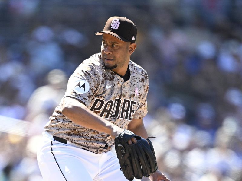 May 12, 2024; San Diego, California, USA; San Diego Padres relief pitcher Wandy Peralta (58) throws a pitch against the Los Angeles Dodgers during the eighth inning at Petco Park. Mandatory Credit: Orlando Ramirez-USA TODAY Sports