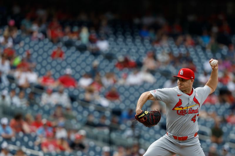 May 11, 2025; Washington, District of Columbia, USA; St. Louis Cardinals pitcher John King (47) pitches against the Washington Nationals during the ninth inning at Nationals Park. Mandatory Credit: Geoff Burke-Imagn Images