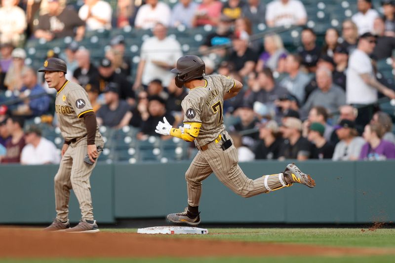 Apr 24, 2024; Denver, Colorado, USA; San Diego Padres shortstop Ha-Seong Kim (7) rounds first on a two RBI double in the first inning against the Colorado Rockies at Coors Field. Mandatory Credit: Isaiah J. Downing-USA TODAY Sports