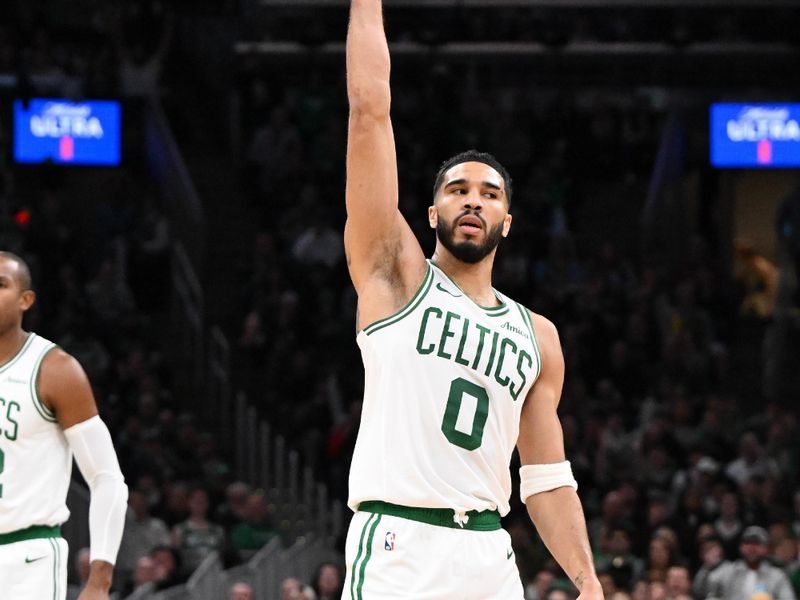 BOSTON, MASSACHUSETTS - NOVEMBER 24: Jayson Tatum #0 of the Boston Celtics reacts after making a three-point basket against the Minnesota Timberwolves during the second quarter at the TD Garden on November 24, 2024 in Boston, Massachusetts. NOTE TO USER: User expressly acknowledges and agrees that, by downloading and or using this photograph, User is consenting to the terms and conditions of the Getty Images License Agreement. (Photo by Brian Fluharty/Getty Images)