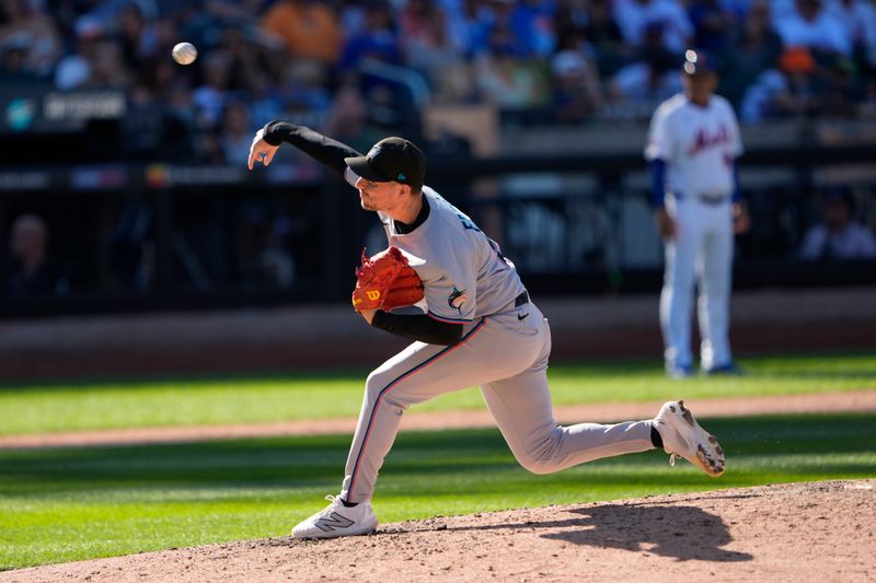 Aug 31, 2025; New York City, New York, USA; Miami Marlins pitcher Calvin Faucher (53) delivers a pitch against the New York Mets during the eighth inning at Citi Field. Mandatory Credit: Gregory Fisher-Imagn Images