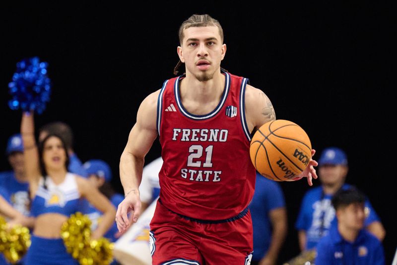 Feb 6, 2024; San Jose, California, USA; Fresno State Bulldogs guard Isaiah Pope (21) dribbles the ball against the San Jose State Spartans during the first half at Provident Credit Union Event Center. Mandatory Credit: Robert Edwards-USA TODAY Sports