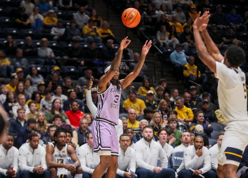 Jan 27, 2026; Morgantown, West Virginia, USA; Kansas State Wildcats guard CJ Jones (3) shoots a three pointer during the first half against the West Virginia Mountaineers at Hope Coliseum. Mandatory Credit: Ben Queen-Imagn Imagesa