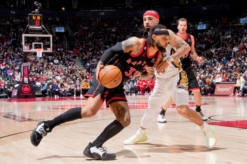 TORONTO, CANADA - FEBRUARY 23: Gary Trent Jr. #33 of the Toronto Raptors dribbles the ball against the New Orleans Pelicans on February 23, 2023 at the Scotiabank Arena in Toronto, Ontario, Canada.  NOTE TO USER: User expressly acknowledges and agrees that, by downloading and or using this Photograph, user is consenting to the terms and conditions of the Getty Images License Agreement.  Mandatory Copyright Notice: Copyright 2023 NBAE (Photo by Mark Blinch/NBAE via Getty Images)