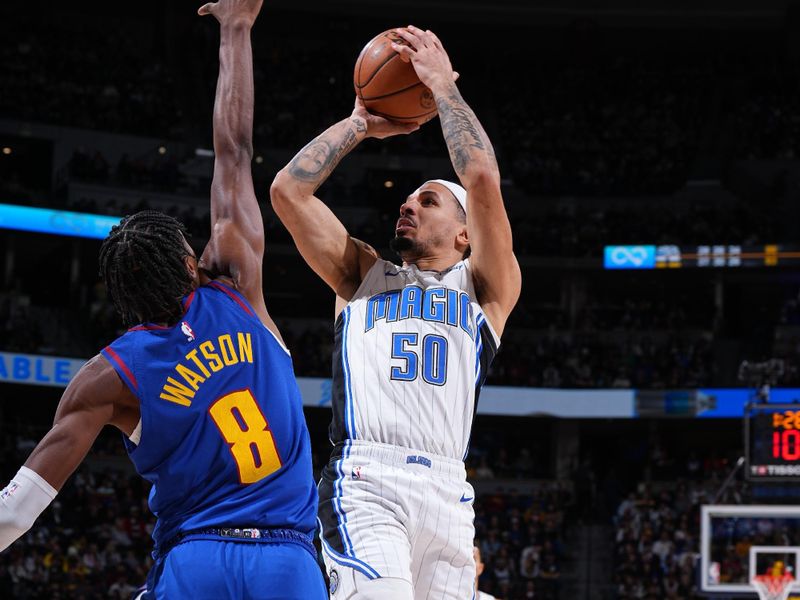 DENVER, CO - JANUARY 5: Cole Anthony #50 of the Orlando Magic shoots the ball during the game against the Denver Nuggets on January 5, 2024 at the Ball Arena in Denver, Colorado. NOTE TO USER: User expressly acknowledges and agrees that, by downloading and/or using this Photograph, user is consenting to the terms and conditions of the Getty Images License Agreement. Mandatory Copyright Notice: Copyright 2024 NBAE (Photo by Garrett Ellwood/NBAE via Getty Images)