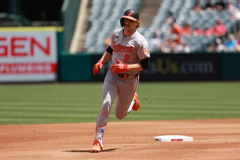 Apr 24, 2024; Anaheim, California, USA;  Baltimore Orioles shortstop Gunnar Henderson (2) runs around bases after hitting a home run during the third inning against the Los Angeles Angels at Angel Stadium. Mandatory Credit: Kiyoshi Mio-USA TODAY Sports