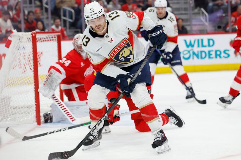 Mar 2, 2024; Detroit, Michigan, USA; Florida Panthers center Sam Reinhart (13) skates with the puck in the third period against the Detroit Red Wings at Little Caesars Arena. Mandatory Credit: Rick Osentoski-USA TODAY Sports