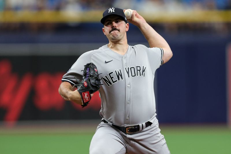 Aug 27, 2023; St. Petersburg, Florida, USA;  New York Yankees starting pitcher Carlos Rodon (55) throws a pitch against the Tampa Bay Rays in the first inning at Tropicana Field. Mandatory Credit: Nathan Ray Seebeck-USA TODAY Sports