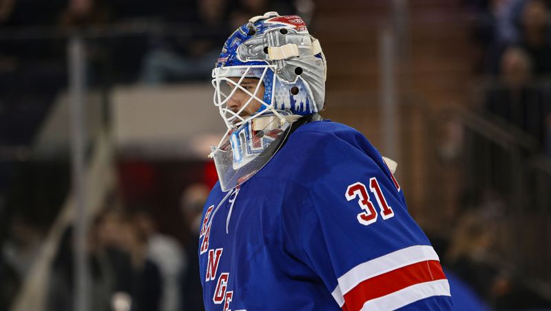 Sep 24, 2024; New York, New York, USA; New York Rangers goalie Igor Shesterkin (31) skates to the bench during the second period against the New York Islanders at Madison Square Garden. Mandatory Credit: Danny Wild-Imagn Images