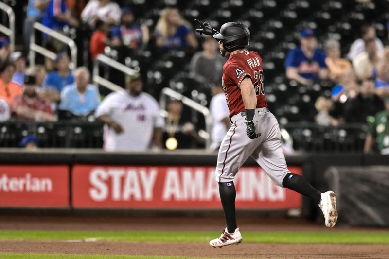 Sep 11, 2023; New York City, New York, USA; Arizona Diamondbacks left fielder Tommy Pham (28) rounds the bases after hitting a solo home run against the New York Mets during the eighth inning at Citi Field. Mandatory Credit: John Jones-USA TODAY Sports