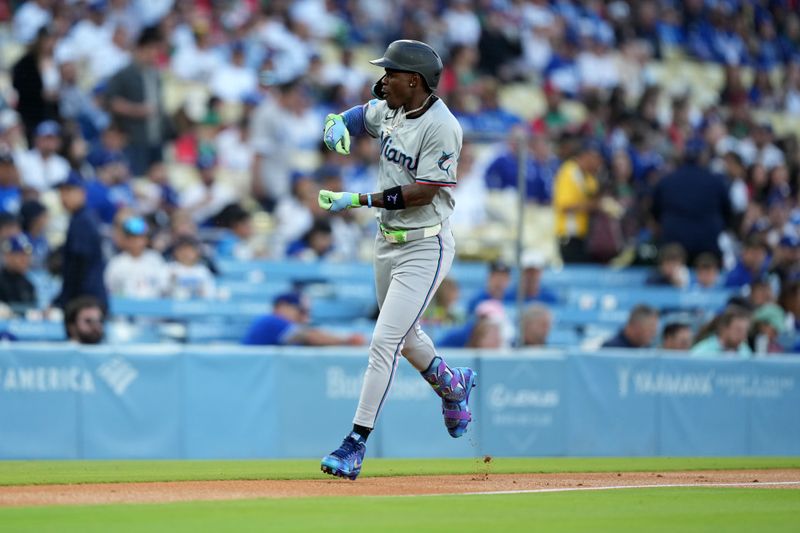 May 7, 2024; Los Angeles, California, USA; Miami Marlins center fielder Jazz Chisholm Jr. (2) celebrates after hitting a home run in the first inning against the Los Angeles Dodgers at Dodger Stadium. Mandatory Credit: Kirby Lee-USA TODAY Sports