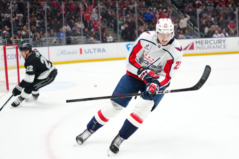 Dec 2, 2025; Los Angeles, California, USA; Washington Capitals center Aliaksei Protas (21) celebrates after a goal against the LA Kings in the third period at Crypto.com Arena. Mandatory Credit: Kirby Lee-Imagn Images