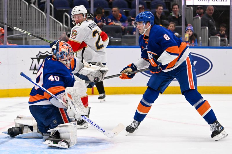 Oct 26, 2024; Elmont, New York, USA;  New York Islanders goaltender Semyon Varlamov (40) makes a save against the Florida Panthers during the third period at UBS Arena. Mandatory Credit: Dennis Schneidler-Imagn Images