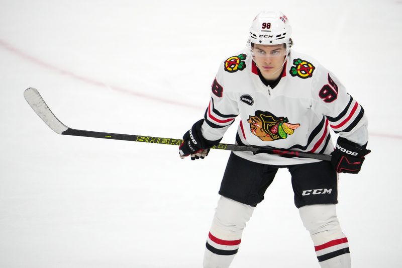 Nov 12, 2023; Sunrise, Florida, USA; Chicago Blackhawks center Connor Bedard (98) takes a position on the ice during the third period against the Florida Panthers at Amerant Bank Arena. Mandatory Credit: Jasen Vinlove-USA TODAY Sports