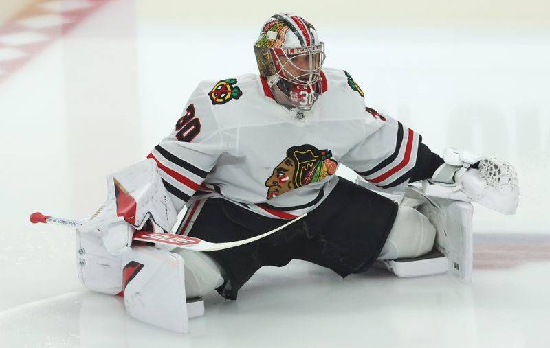 Apr 8, 2025; Pittsburgh, Pennsylvania, USA;  Chicago Blackhawks goaltender Spencer Knight (30) warms up before the game against the Pittsburgh Penguins at PPG Paints Arena. Mandatory Credit: Charles LeClaire-Imagn Images