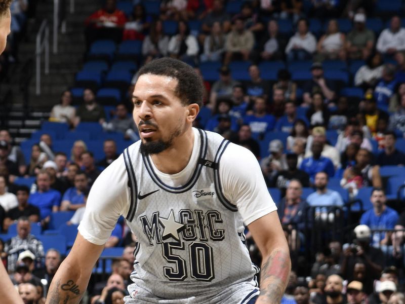 ORLANDO, FL - FEBRUARY 10: Cole Anthony #50 of the Orlando Magic handles the ball during the game against the Atlanta Hawks on February 10, 2025 at Kia Center in Orlando, Florida. NOTE TO USER: User expressly acknowledges and agrees that, by downloading and or using this photograph, User is consenting to the terms and conditions of the Getty Images License Agreement. Mandatory Copyright Notice: Copyright 2025 NBAE (Photo by Fernando Medina/NBAE via Getty Images)