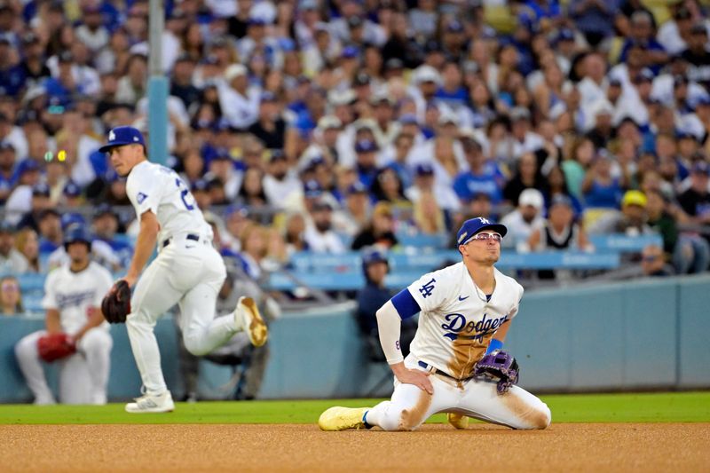Oct 20, 2024; Los Angeles, California, USA; Los Angeles Dodgers third baseman Enrique Hernandez (8) reacts in the third inning against the New York Mets during game six of the NLCS for the 2024 MLB playoffs at Dodger Stadium. Mandatory Credit: Jayne Kamin-Oncea-Imagn Images