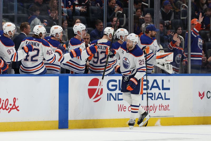Mar 14, 2025; Elmont, New York, USA; Edmonton Oilers center Leon Draisaitl (29) celebrates his goal against the New York Islanders during the second period at UBS Arena. Mandatory Credit: Thomas Salus-Imagn Images