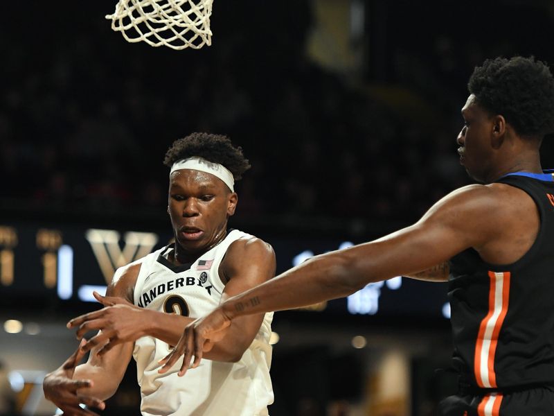 Mar 9, 2024; Nashville, Tennessee, USA; Vanderbilt Commodores forward Ven-Allen Lubin (2) grabs a rebound against Florida Gators forward Tyrese Samuel (4) during the first half at Memorial Gymnasium. Mandatory Credit: Christopher Hanewinckel-USA TODAY Sports