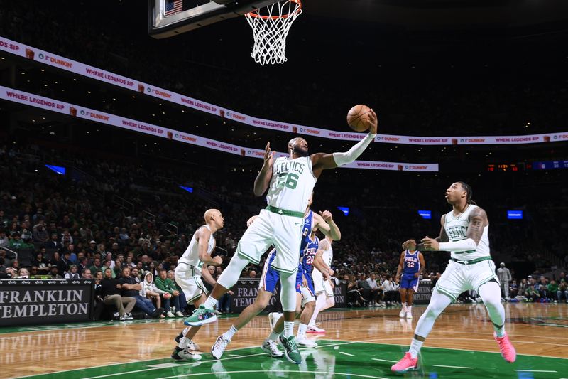 BOSTON, MA - OCTOBER 12: Xavier Tillman #26 of the Boston Celtics goes up for the rebound during the game against the Philadelphia 76ers during a NBA Preseason game on October 12, 2024 at TD Garden in Boston, Massachusetts. NOTE TO USER: User expressly acknowledges and agrees that, by downloading and/or using this Photograph, user is consenting to the terms and conditions of the Getty Images License Agreement. Mandatory Copyright Notice: Copyright 2024 NBAE (Photo by Brian Babineau/NBAE via Getty Images)