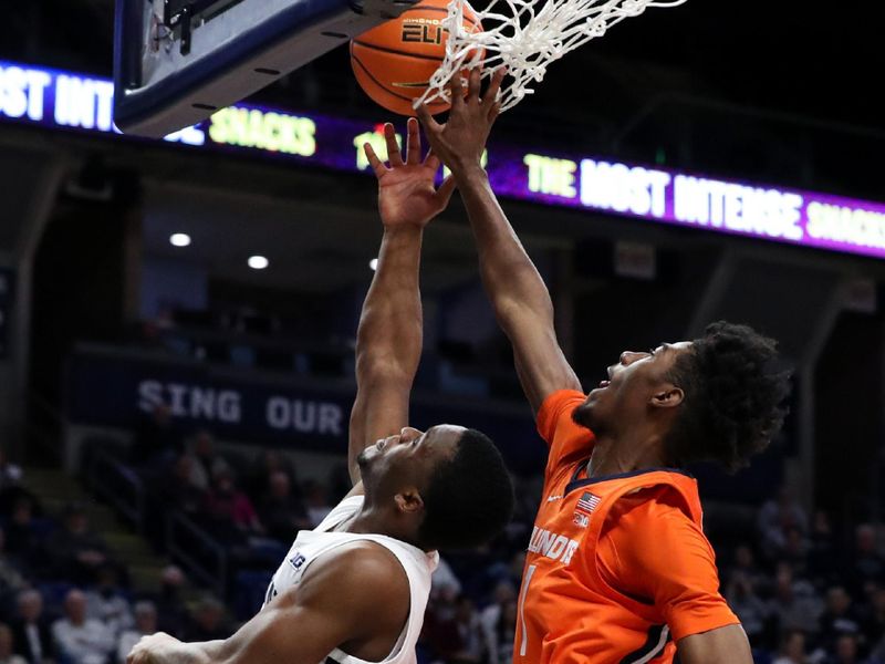 Feb 14, 2023; University Park, Pennsylvania, USA; Penn State Nittany Lions guard Kanye Clary (0) drives the ball to the basket as Illinois Fighting Illini guard Sencire Harris (1) attempts to block the shot during the first half at Bryce Jordan Center. Penn State defeated Illinois 93-81. Mandatory Credit: Matthew OHaren-USA TODAY Sports