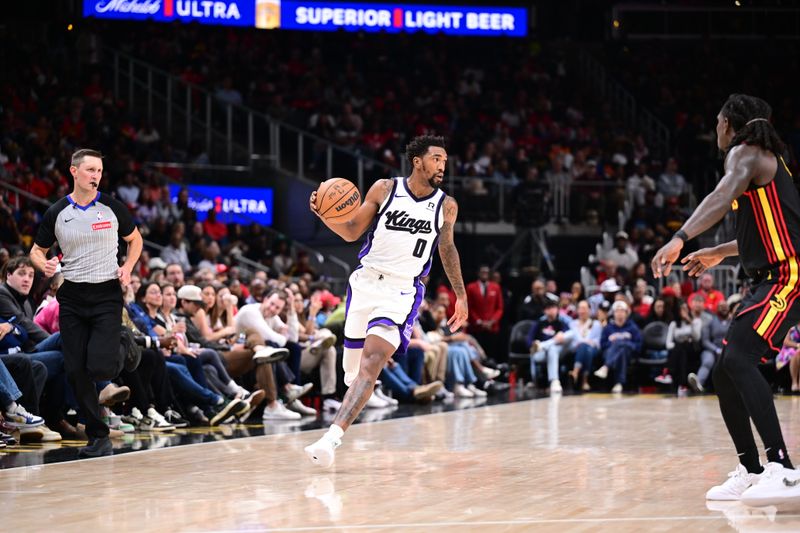 ATLANTA, GA - NOVEMBER 1: Malik Monk #0 of the Sacramento Kings handles the ball during the game against the Atlanta Hawks on November 1, 2024 at State Farm Arena in Atlanta, Georgia.  NOTE TO USER: User expressly acknowledges and agrees that, by downloading and/or using this Photograph, user is consenting to the terms and conditions of the Getty Images License Agreement. Mandatory Copyright Notice: Copyright 2024 NBAE (Photo by Adam Hagy/NBAE via Getty Images)