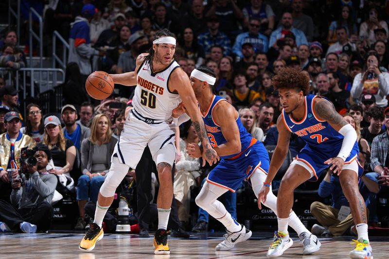 DENVER, CO - MARCH 21: Aaron Gordon #50 of the Denver Nuggets handles the ball during the game against the New York Knicks on March 21, 2024 at the Ball Arena in Denver, Colorado. NOTE TO USER: User expressly acknowledges and agrees that, by downloading and/or using this Photograph, user is consenting to the terms and conditions of the Getty Images License Agreement. Mandatory Copyright Notice: Copyright 2024 NBAE (Photo by Garrett Ellwood/NBAE via Getty Images)