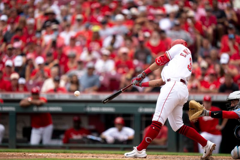 Aug 9, 2023; Cincinnati, OH, USA; Cincinnati Reds first baseman Christian Encarnacion-Strand (33) hits an RBI base hit in the sixth inning of the MLB baseball game between Cincinnati Reds and Miami Marlins at Great American Ball Park in Cincinnati on Wednesday, Aug. 9, 2023.  Mandatory Credit: Albert Cesare-USA TODAY Sports