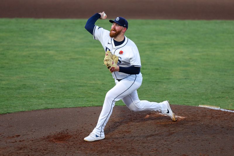 May 26, 2025; Tampa, Florida, USA; Tampa Bay Rays starting pitcher Zack Littell (52) throws a pitch against the Minnesota Twins in the fourth inning at George M. Steinbrenner Field. Mandatory Credit: Nathan Ray Seebeck-Imagn Images