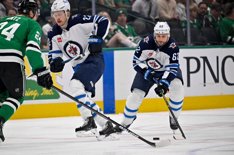 Apr 10, 2025; Dallas, Texas, USA; Winnipeg Jets center Mason Appleton (22) and right wing Nino Niederreiter (62) skates against the Dallas Stars during the first period at the American Airlines Center. Mandatory Credit: Jerome Miron-Imagn Images
