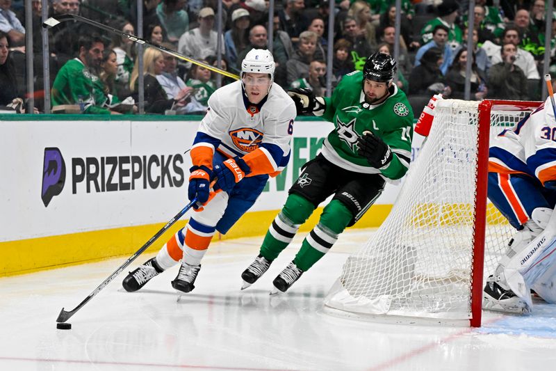 Feb 26, 2024; Dallas, Texas, USA; New York Islanders defenseman Ryan Pulock (6) skates with the puck as Dallas Stars left wing Jamie Benn (14) chases during the second period at the American Airlines Center. Mandatory Credit: Jerome Miron-USA TODAY Sports