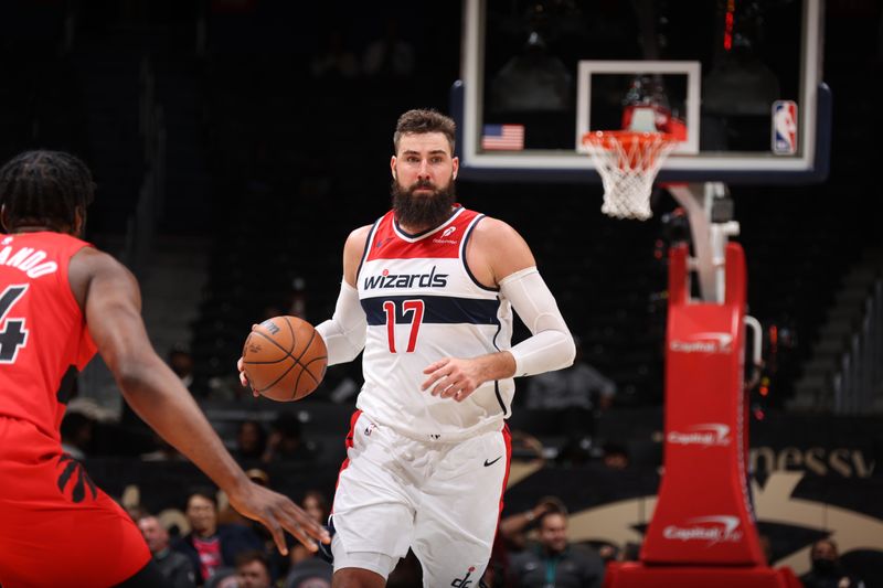 WASHINGTON, DC -? OCTOBER 11: Jonas Valanciunas #17 of the Washington Wizards dribbles the ball during the game against the Toronto Raptors during a NBA preseason game on October 11, 2024 at Capital One Arena in Washington, DC. NOTE TO USER: User expressly acknowledges and agrees that, by downloading and or using this Photograph, user is consenting to the terms and conditions of the Getty Images License Agreement. Mandatory Copyright Notice: Copyright 2024 NBAE (Photo by Stephen Gosling/NBAE via Getty Images)