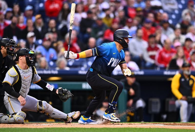 Apr 12, 2024; Philadelphia, Pennsylvania, USA; Philadelphia Phillies designated hitter Kyle Schwarber (12) hits a single against the Pittsburgh Pirates in the first inning at Citizens Bank Park. Mandatory Credit: Kyle Ross-USA TODAY Sports