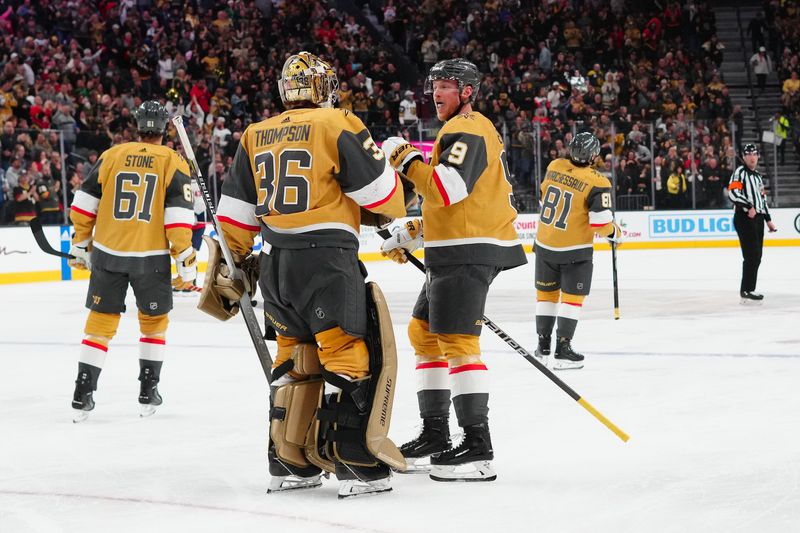 Dec 2, 2023; Las Vegas, Nevada, USA; Vegas Golden Knights center Jack Eichel (9) celebrates with Vegas Golden Knights goaltender Logan Thompson (36) after assisting on a goal scored by Vegas Golden Knights right wing Jonathan Marchessault (81) against the Washington Capitals during the first period at T-Mobile Arena. Mandatory Credit: Stephen R. Sylvanie-USA TODAY Sports