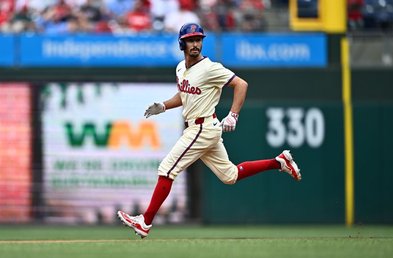 Jun 5, 2024; Philadelphia, Pennsylvania, USA; Philadelphia Phillies catcher Garrett Stubbs (21) steals second base against the Milwaukee Brewers in the second inning at Citizens Bank Park. Mandatory Credit: Kyle Ross-USA TODAY Sports