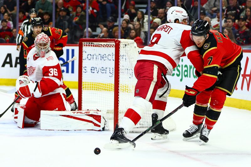 Feb 26, 2026; Ottawa, Ontario, CAN; Detroit Red Wings defenseman Ben Chiarot (8) hits Ottawa Senators left wing Brady Tkachuk (7) as he attempts to make a pass during the first period at Canadian Tire Centre. Mandatory Credit: Keito Newman-Imagn Images