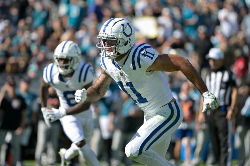 Indianapolis Colts wide receiver Michael Pittman Jr. (11) runs a route during the second half of an NFL football game against the Jacksonville Jaguars, Sunday, Oct. 15, 2023, in Jacksonville, Fla. (AP Photo/Phelan M. Ebenhack)