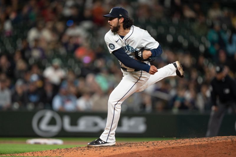 Sep 11, 2024; Seattle, Washington, USA;  Seattle Mariners reliever Andres Munoz (75) delivers a pitch during the ninth inning against the San Diego Padres at T-Mobile Park. Mandatory Credit: Stephen Brashear-Imagn Images