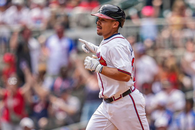 Apr 20, 2025; Cumberland, Georgia, USA; Atlanta Braves catcher Drake Baldwin (30) reacts after hitting a home run against the Minnesota Twins during the third inning at Truist Park. Mandatory Credit: Dale Zanine-Imagn Images