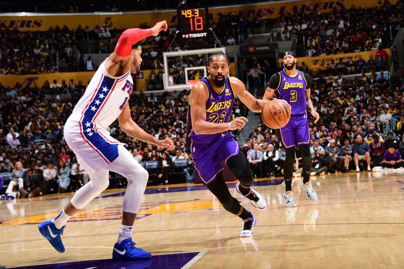 LOS ANGELES, CA - MARCH 22: Spencer Dinwiddie #26 of the Los Angeles Lakers dribbles the ball during the game against the Philadelphia 76ers on March 22, 2024 at Crypto.Com Arena in Los Angeles, California. NOTE TO USER: User expressly acknowledges and agrees that, by downloading and/or using this Photograph, user is consenting to the terms and conditions of the Getty Images License Agreement. Mandatory Copyright Notice: Copyright 2024 NBAE (Photo by Adam Pantozzi/NBAE via Getty Images)