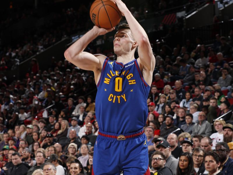 PORTLAND, OR - MARCH 23: Christian Braun #0 of the Denver Nuggets shoots the ball during the game against the Portland Trail Blazers on March 23, 2024 at the Moda Center Arena in Portland, Oregon. NOTE TO USER: User expressly acknowledges and agrees that, by downloading and or using this photograph, user is consenting to the terms and conditions of the Getty Images License Agreement. Mandatory Copyright Notice: Copyright 2024 NBAE (Photo by Cameron Browne/NBAE via Getty Images)