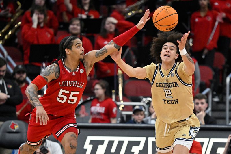 Feb 10, 2024; Louisville, Kentucky, USA; Louisville Cardinals guard Skyy Clark (55) scrambles for a loose ball with Georgia Tech Yellow Jackets guard Naithan George (2) during the first half at KFC Yum! Center. Mandatory Credit: Jamie Rhodes-USA TODAY Sports