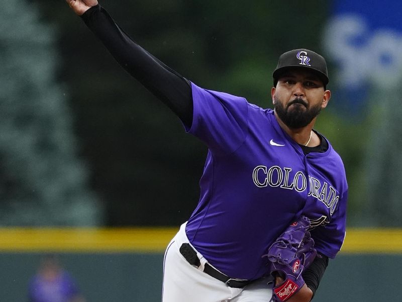 Jun 24, 2025; Denver, Colorado, USA; Colorado Rockies pitcher German Marquez (48) delivers a pitch in the first inning against the Los Angeles Dodgers at Coors Field. Mandatory Credit: Ron Chenoy-Imagn Images