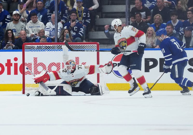 May 7, 2025; Toronto, Ontario, CAN; Florida Panthers goaltender Sergei Bobrovsky (72) stops the puck against the Toronto Maple Leafs during the second period in game two of the second round of the 2025 Stanley Cup Playoffs at Scotiabank Arena. Mandatory Credit: Nick Turchiaro-Imagn Images