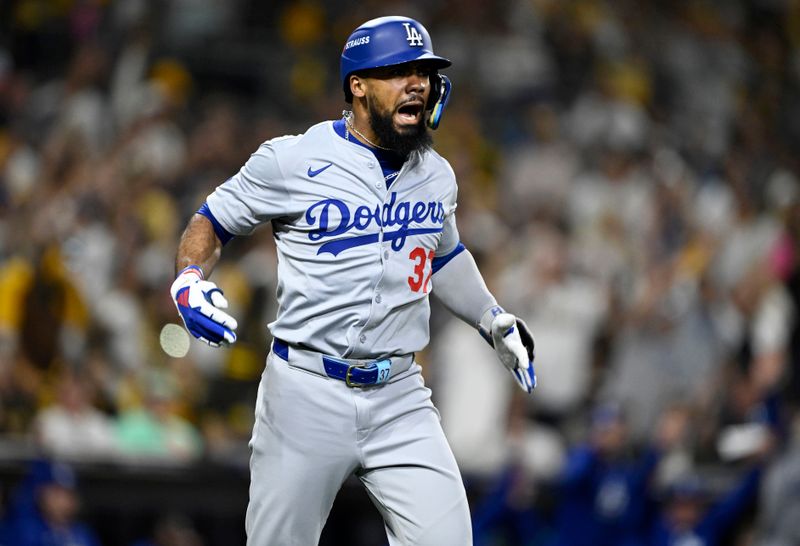 Oct 8, 2024; San Diego, California, USA; Los Angeles Dodgers outfielder Teoscar Hernandez (37) celebrates after hitting a grand slam in the third inning against the San Diego Padres during game three of the NLDS for the 2024 MLB Playoffs at Petco Park.  Mandatory Credit: Denis Poroy-Imagn Images