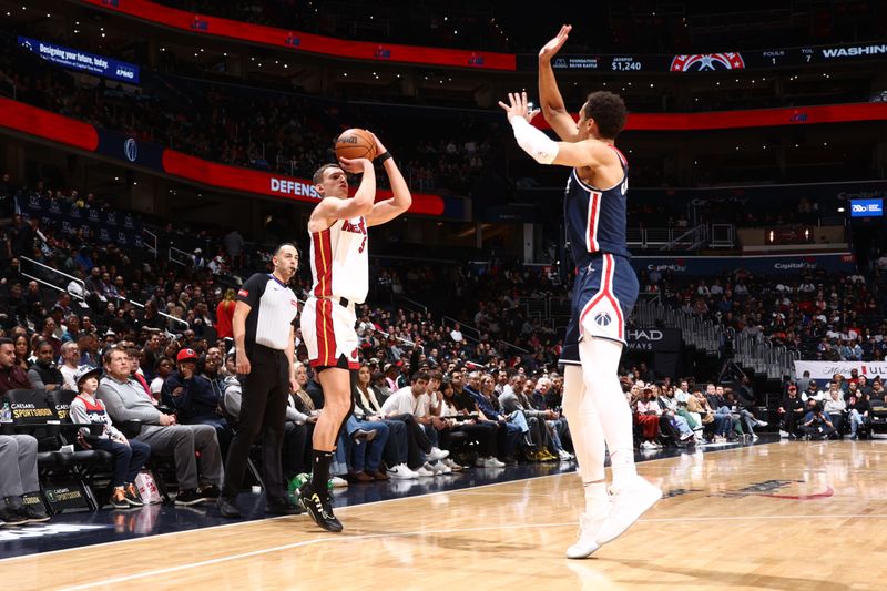 WASHINGTON, DC -? MARCH 31: Nikola Jovic #5 of the Miami Heat shoots the ball during the game against the Washington Wizards on March 31, 2024 at Capital One Arena in Washington, DC. NOTE TO USER: User expressly acknowledges and agrees that, by downloading and or using this Photograph, user is consenting to the terms and conditions of the Getty Images License Agreement. Mandatory Copyright Notice: Copyright 2024 NBAE (Photo by Kenny Giarla/NBAE via Getty Images)