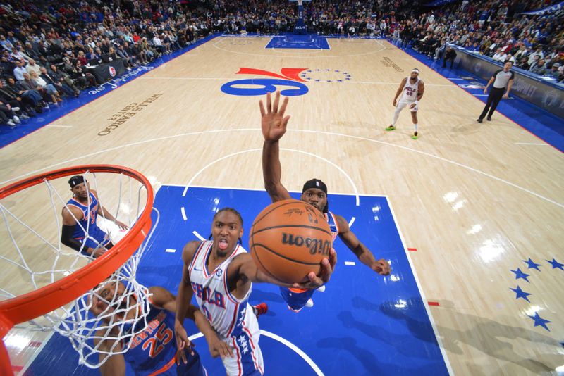 PHILADELPHIA, PA - JANUARY 15: Tyrese Maxey #0 of the Philadelphia 76ers drives to the basket during the game against the New York Knicks on January 15, 2025 at the Wells Fargo Center in Philadelphia, Pennsylvania NOTE TO USER: User expressly acknowledges and agrees that, by downloading and/or using this Photograph, user is consenting to the terms and conditions of the Getty Images License Agreement. Mandatory Copyright Notice: Copyright 2025 NBAE (Photo by Jesse D. Garrabrant/NBAE via Getty Images)