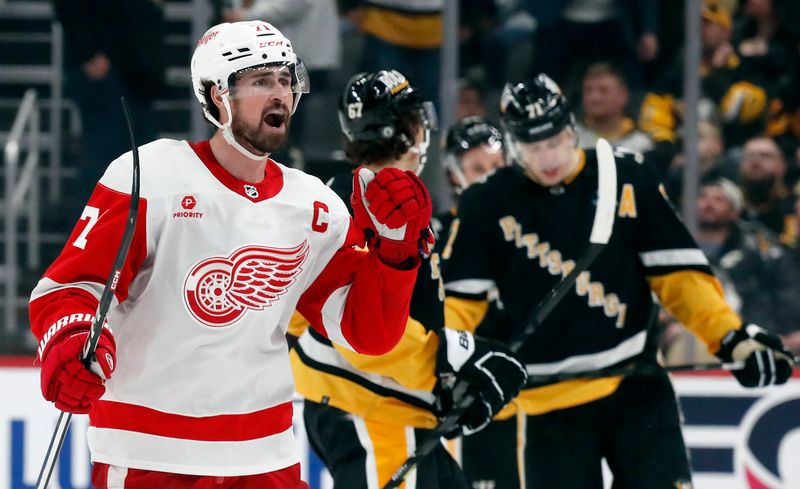 Apr 11, 2024; Pittsburgh, Pennsylvania, USA; Detroit Red Wings center Dylan Larkin (71) reacts after scoring a goal against the Pittsburgh Penguins during the third period at PPG Paints Arena. Pittsburgh won 6-5 in overtime. Mandatory Credit: Charles LeClaire-USA TODAY Sports